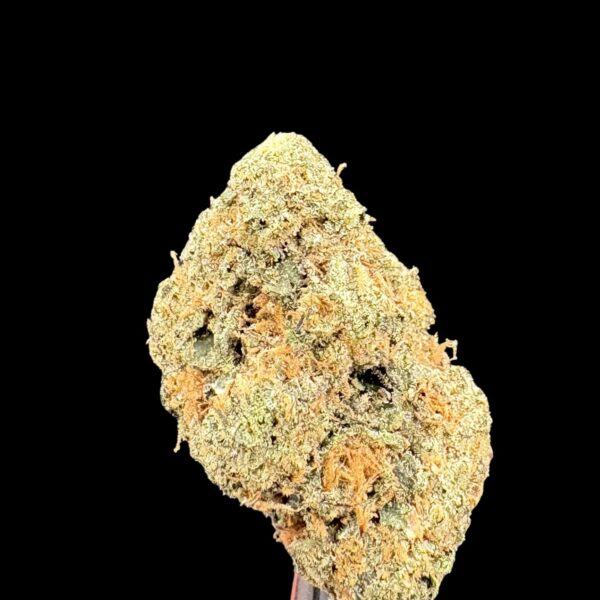 Close-up of a dense cannabis bud with frosty trichomes and orange pistils against a black background.