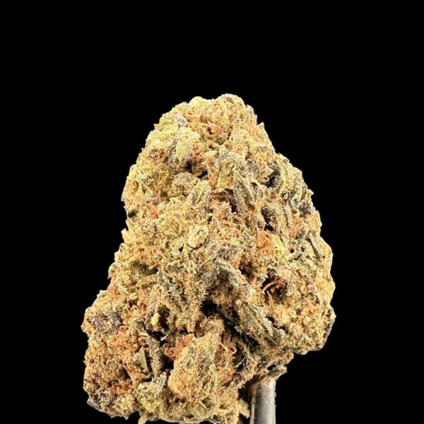 Close-up of a dense cannabis bud with frosty trichomes and orange pistils against a black background.