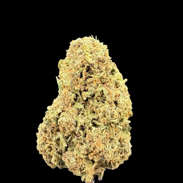 Dense cannabis bud with orange pistils and a frosty coating of trichomes against a black background, close-up.