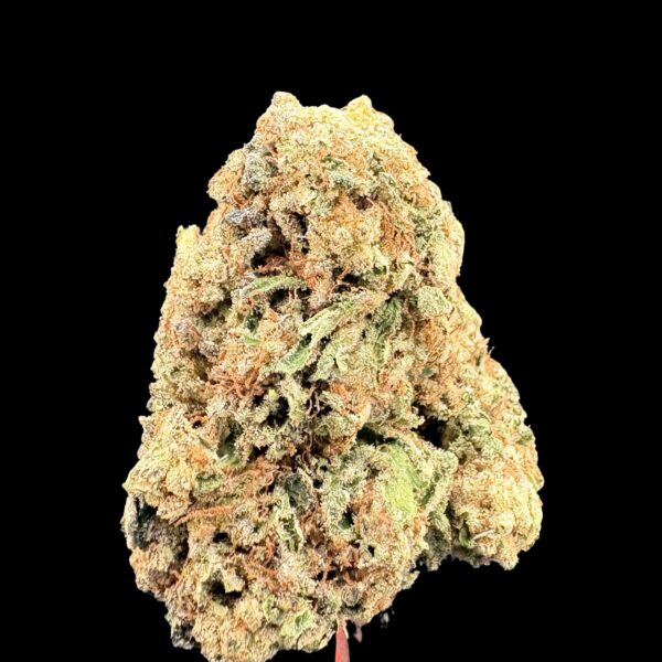 Close-up of a dense cannabis bud with frosty trichomes and orange pistils against a black background, highlighting its color and texture.