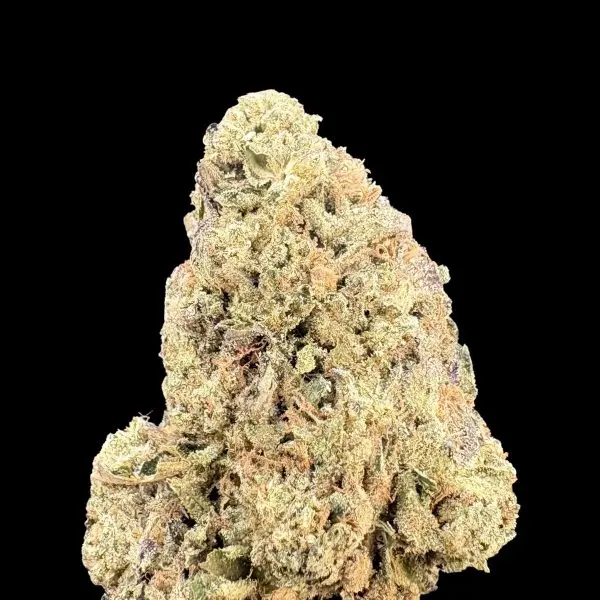 Close-up of a dense cannabis bud covered in trichomes against a black background.